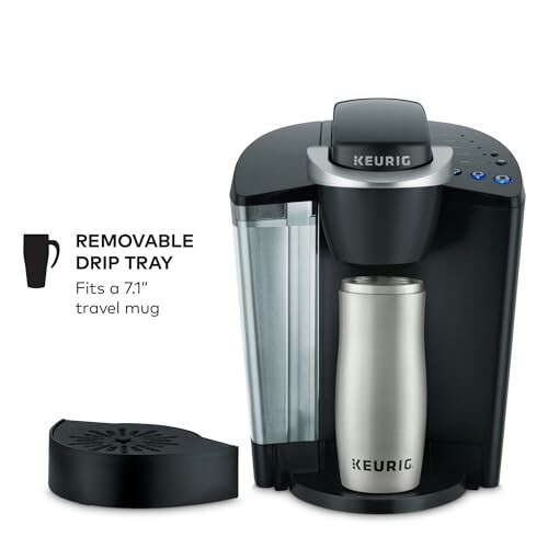 Keurig coffee maker with removable drip tray and travel mug