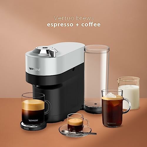 Nespresso Vertuo coffee and espresso machine with cups and milk.