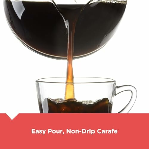 Coffee pouring from a carafe into a glass cup